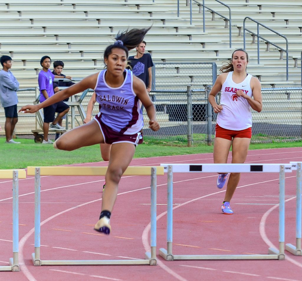 Baldwin's Kacy-Lyn Navarro won the girls 300 hurdles. Photo by Rodney S. Yap.
