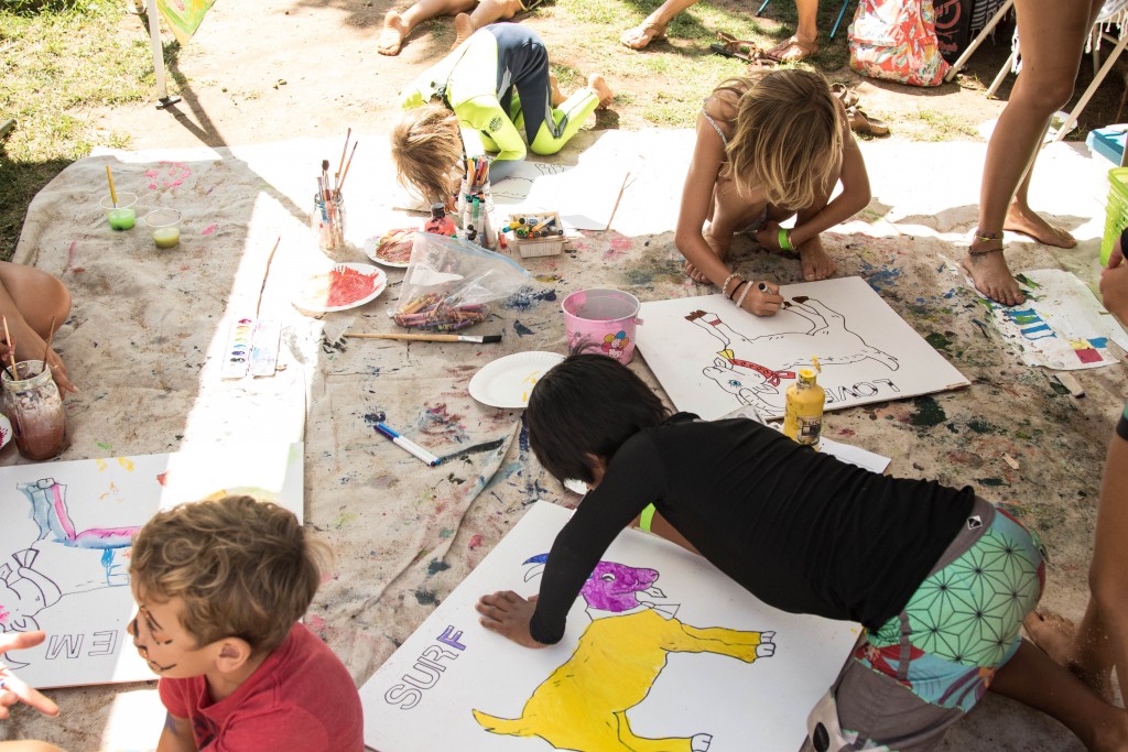 Kids participating in the Art Studio area on the beach Photo: Marc Chambers