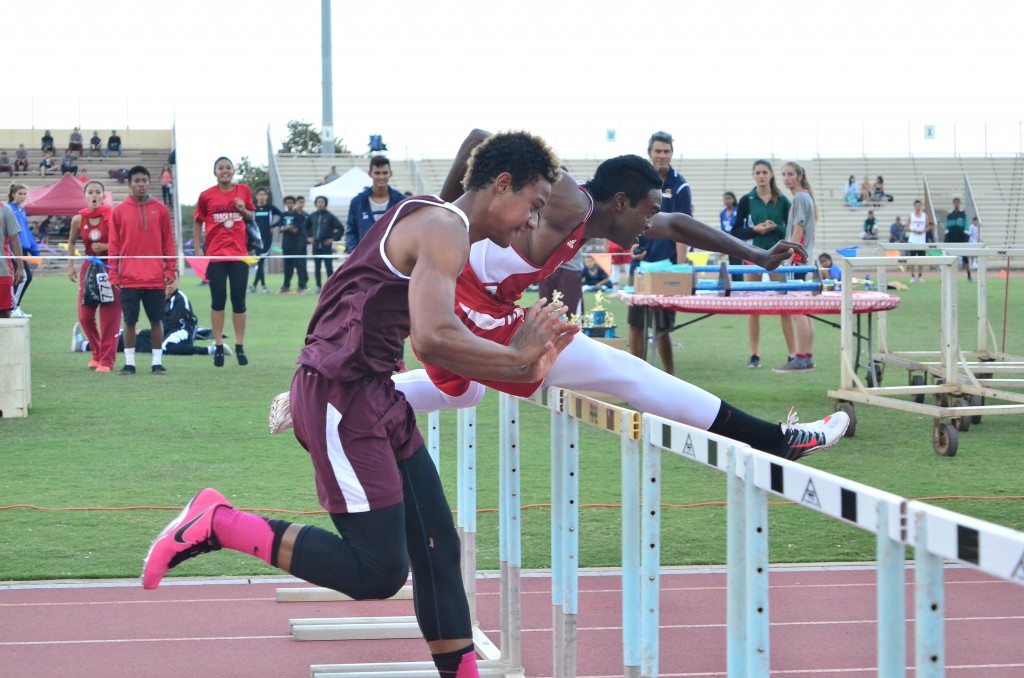 This 11-shot sequence by photographer Glen Pascual shows Baldwin High School's La'akea Kahoohanohano-Davis' attempt to push down the last hurdle in the 110-meter high hurdle race Saturday in the finals of the Victorino Ohana Invitational. But instead of going to the ground, the hurdle bounces back up and wraps itself around Kahoohanohano-Davis as he tries to finish the race. Photo by Glen Pascual.