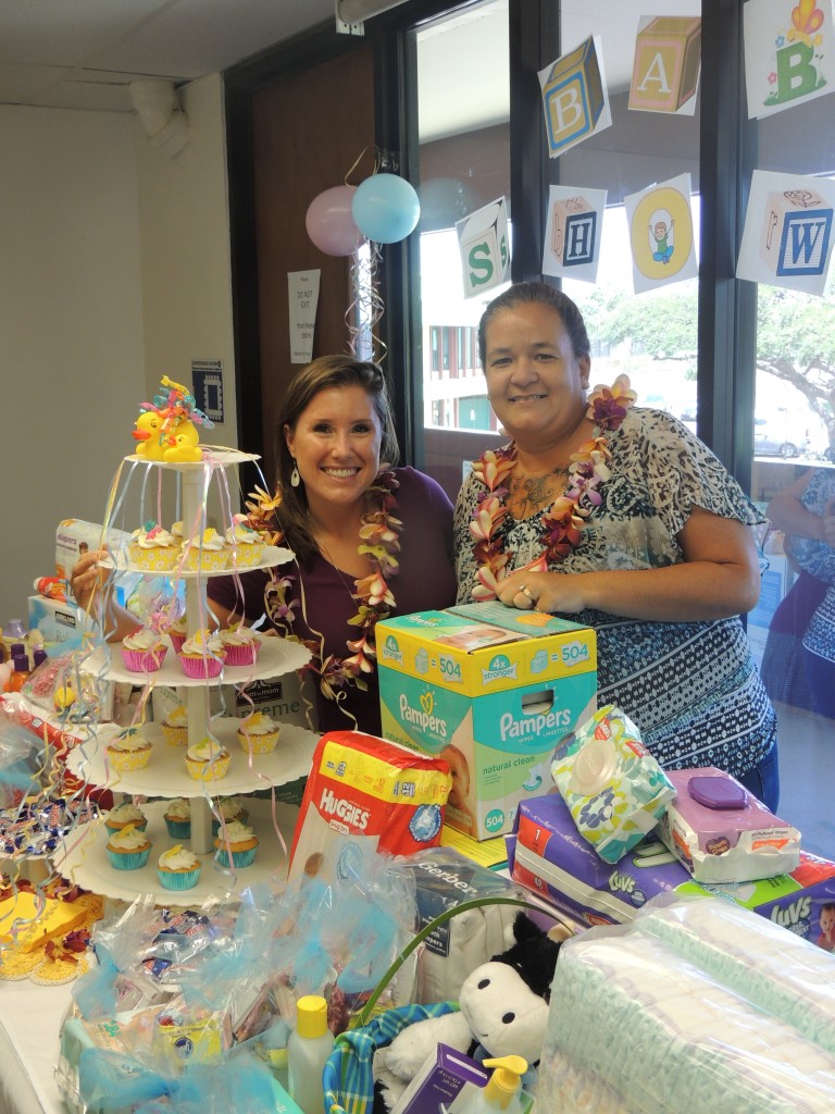 The Maui County Office on Aging had a “Baby Shower” themed staff meeting to benefit local nonprofit Mālama Family Recovery Center. Image: Frances Duberstein and Christine Sa'u. Photo credit: Frances Duberstein.