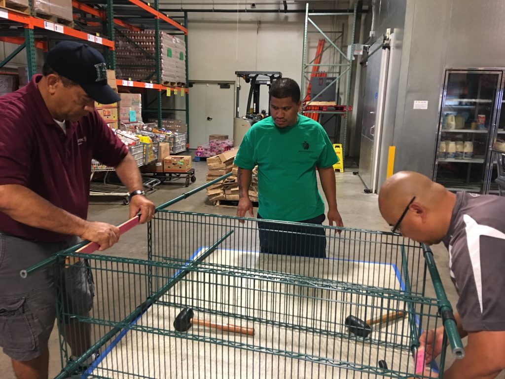 Xerox Maui employees and their family members spent Saturday constructing much needed shelving units at the Maui Food Bank. Photo 4.23.16 Credit: Xerox Maui.