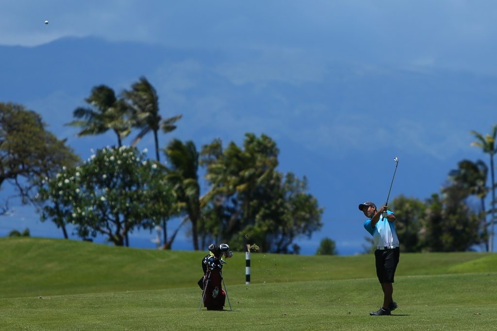 Justin Ngan from Baldwin High School hits his approach to the tenth green during the 2016 MIL Boys and Girls Golf Championship. April 16th, 2016 at the Kāʻanapali Kai Course. Photo credit: Aric Becker.