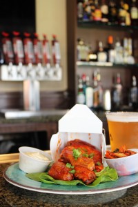 Koholā Brewery's Talk Story American Pale Ale paired with Pailolo Bar & Grill’s Hot Honey Sriracha Wings. Photo courtesy of The Westin Kā‘anapali Ocean Resort Villas.
