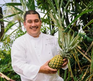 Westin Maui Resort Executive Sous Chef Ikaika Manaku sources local produce, including Maui Gold pineapples. Westin Maui photo.
