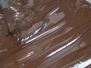 Tempering dark chocolate at Four Seasons Resort Maui. Photo by Kiaora Bohlool.