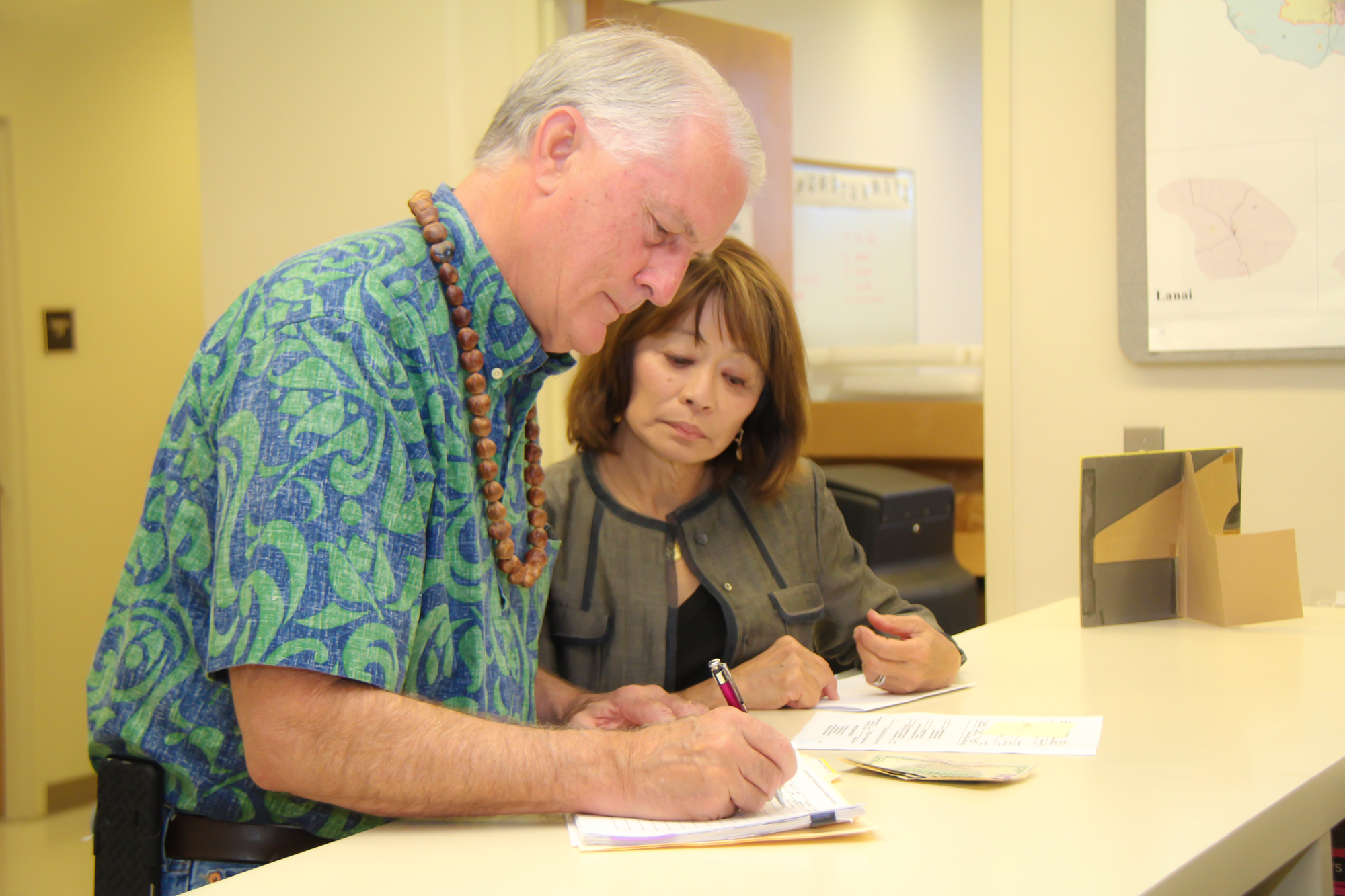 Council Chair Mike White filing for reelection at the County Clerk’s Office with long-time Campaign Manager Leslie Ann Yokouchi.