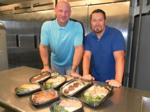 Tom Ockerman and David DeShong, co-founders of Mana Meals. Courtesy photo.