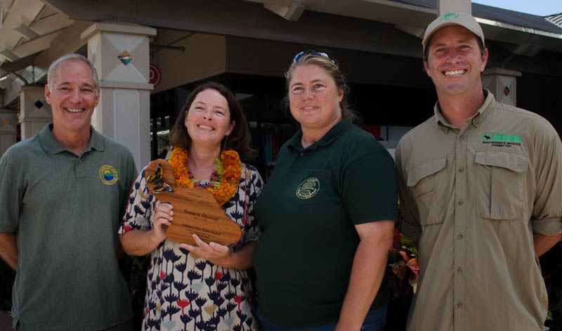 From Left: Rob Parsons, Tamara Sherrill, Allison Wright, and Adam Radford present Mālama i ka ʻĀina Award at Maui Mall on Saturday. Photo Courtesy. 