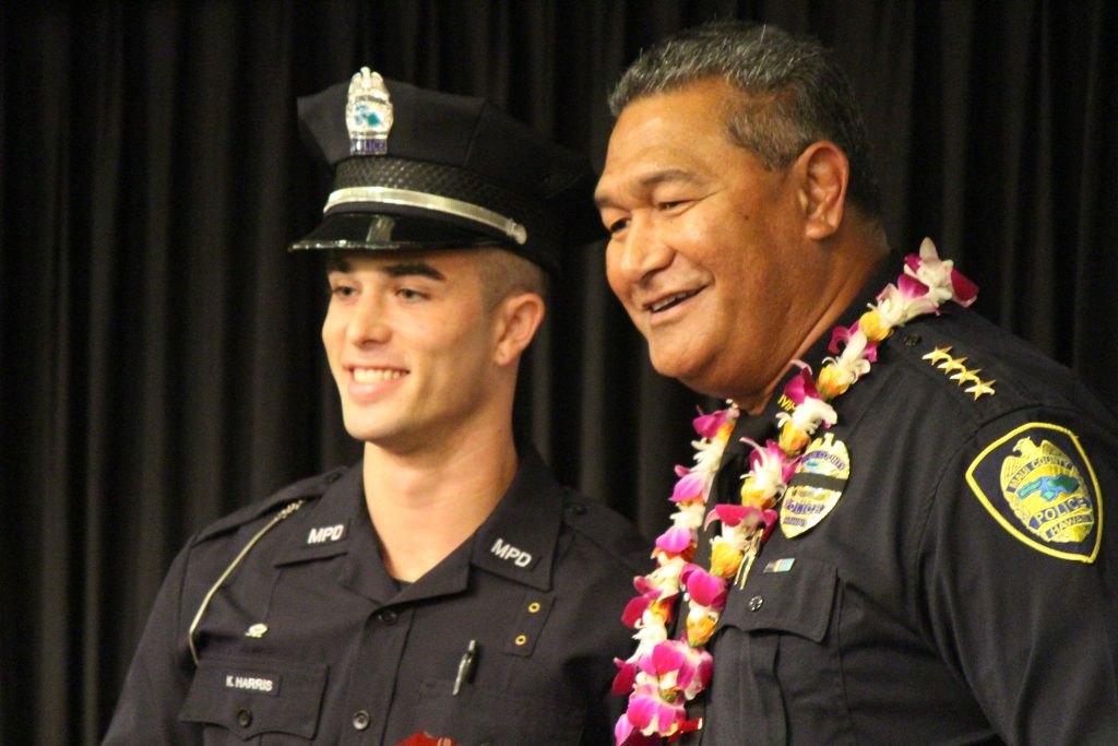 Korey Harris receiving the Outstanding Recruit Award. Maui Police Department 83rd Recruit Class and Emergency Services Dispatchers Graduation. Photo by Wendy Osher.