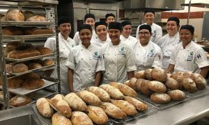 Baking students at UHMC and their freshly-baked bread.  Courtesy photo.