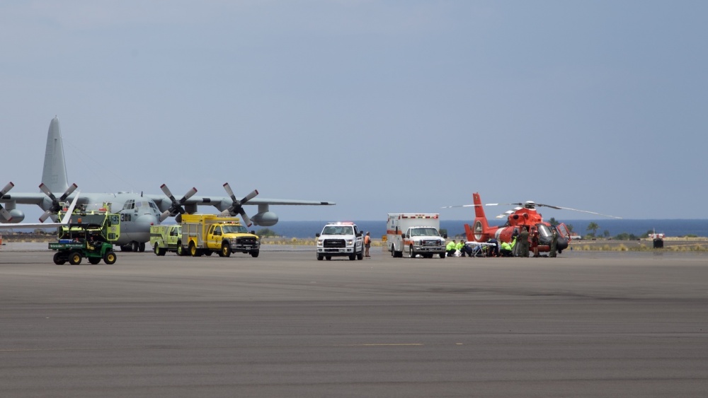  Coast Guard crews safely deliver David McMahon and Sidney Uemoto to emergency medical personnel in Kona, Hawaii, July 15, 2016, following their rescue nine miles off Kona. They were both rescued by a Coast Guard MH-65 Dolphin helicopter crew following an expansive joint search by Navy, Royal New Zealand air force, U.S. Air Force and Coast Guard crews. They reportedly sustained only minor injures in the crash. (U.S. Coast Guard photo by Lt. Cmdr. Kevin Cooper/Released) 