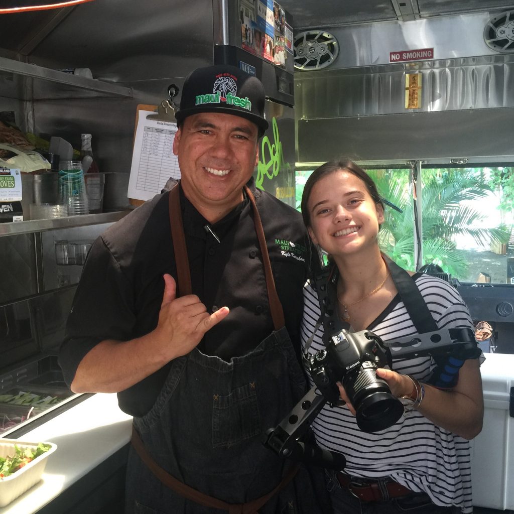 Chef Kyle Kawakami and student Taylor Redman pose for a picture. Redman, a participant with the Huliau Foundation will feature her short film on locally sourced ingredients at the event on Aug. 6. 