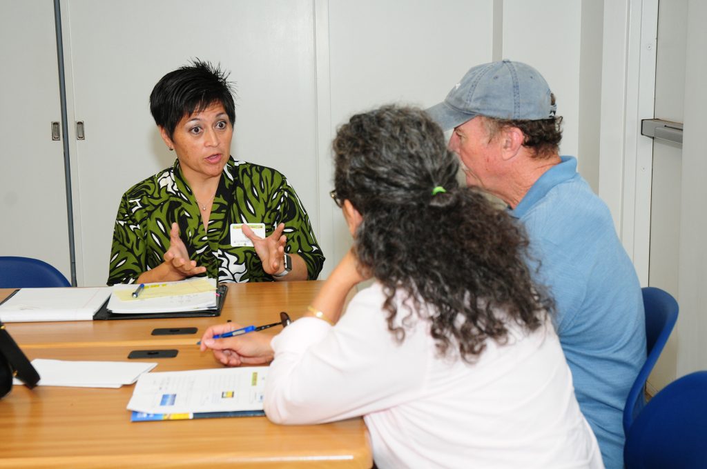 Workshop attendees took advantage of one-on-one consultations with USDA representatives (Denise Oda pictured) about their specific projects. 