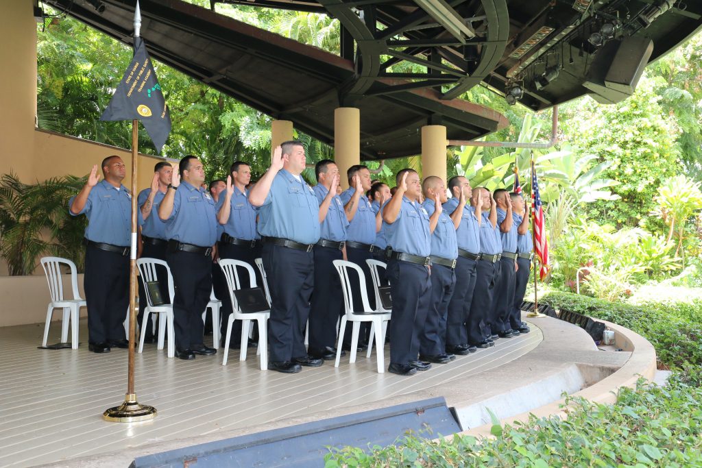 Recruits taking the oath of duty during their graduation ceremony. Photo: DPS.