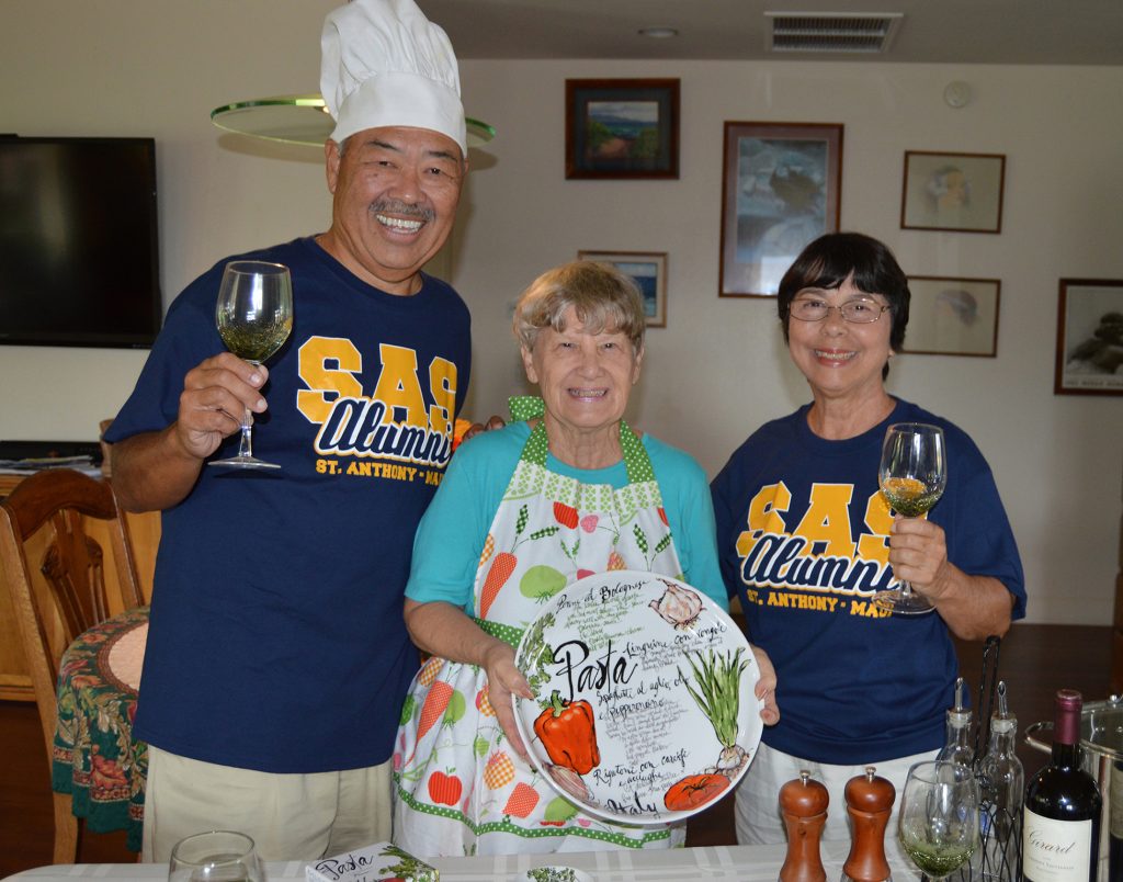 From left, St. Anthony 1972 graduate Alvin Imada; Jan Arensdorf; and Jackie Davis, St. Anthony '62, alumni. Arensdorf and Davis donate all the items for the annual Pasta Table door prize drawing at the St. Anthony Junior-Senior High School Strength In Unity Gala. This year's event will be held from 5 to 9 p.m. Friday, November 11, at the Kamehameha Golf Clubhouse in Waikapū.