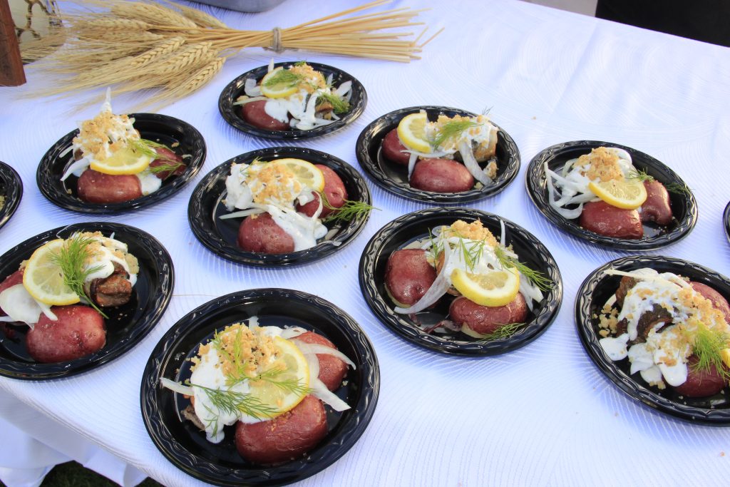 Chef Lee Anne Wong put a local Hawaiian twist to this Oktoberfest dish; Hot smoked pickled Akule with sweet onion, Hawaiian salt potatoes and dill cream. Photo Courtesy: Marlo Antes