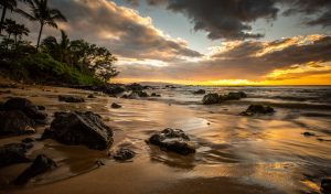 Sunset at Mokapu Beach. Photo Image: Chris Archer
