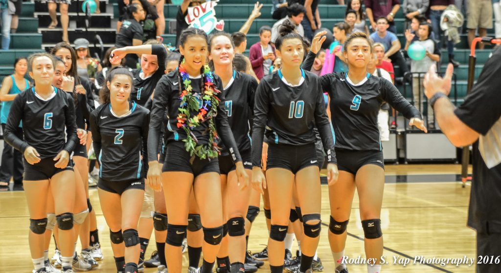 King Kekaulike head coach Al Paschoal waits to congratulate his team Friday after Na Alii defeated the Warriors in four sets. Photo by Rodney S. Yap.