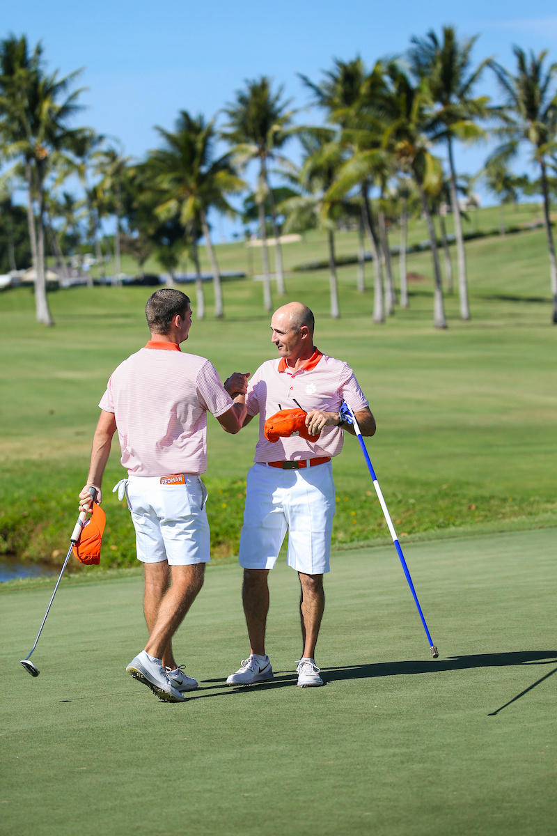 Doc Redman of Clemson is congratulated on the individual title by his coach during the final round of the 3rd annual Kaanapali Classic collegiate invitational. Kaanapali Royal Course Lahaina, Hawaii November 5th, 2016/ Photo by Aric Becker