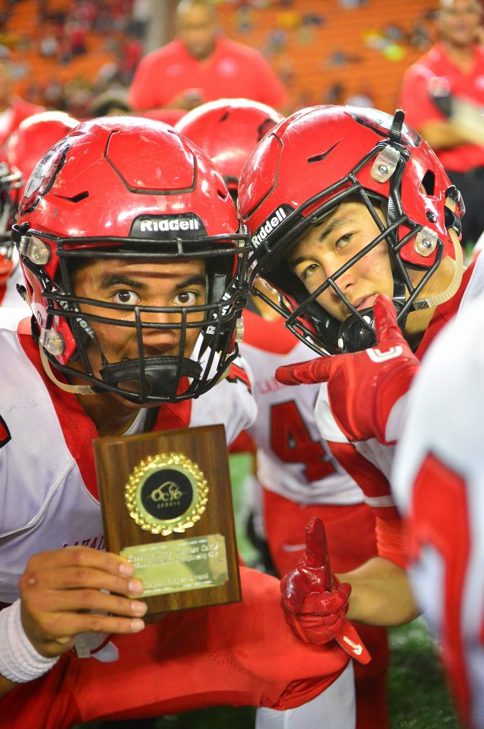 Lahainaluna's Siale Hafoka poses with his OC16 Impact Player of the Game award. Photo by Glen Pascual.