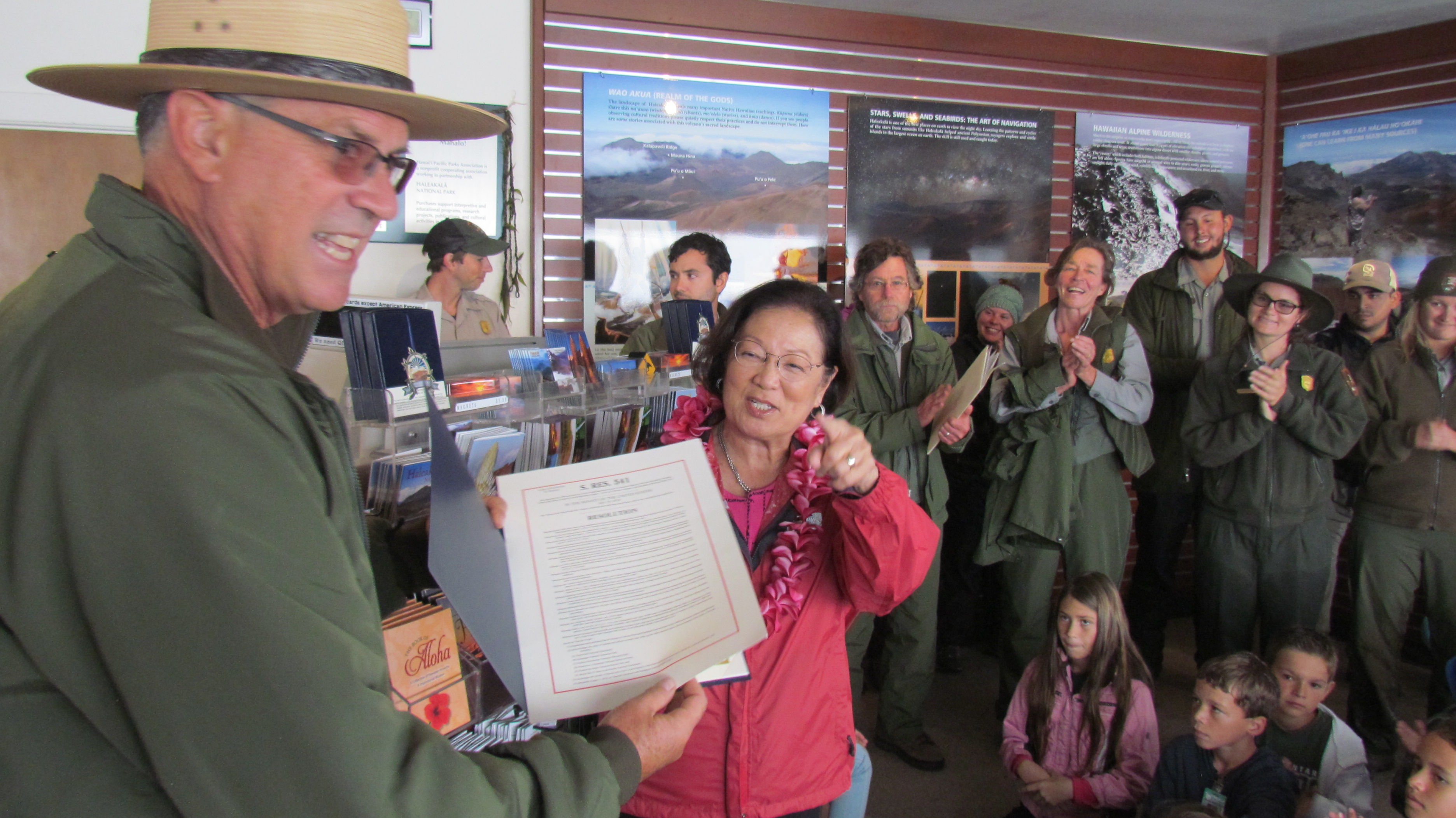 Hirono presents park staff with centennial resolution.