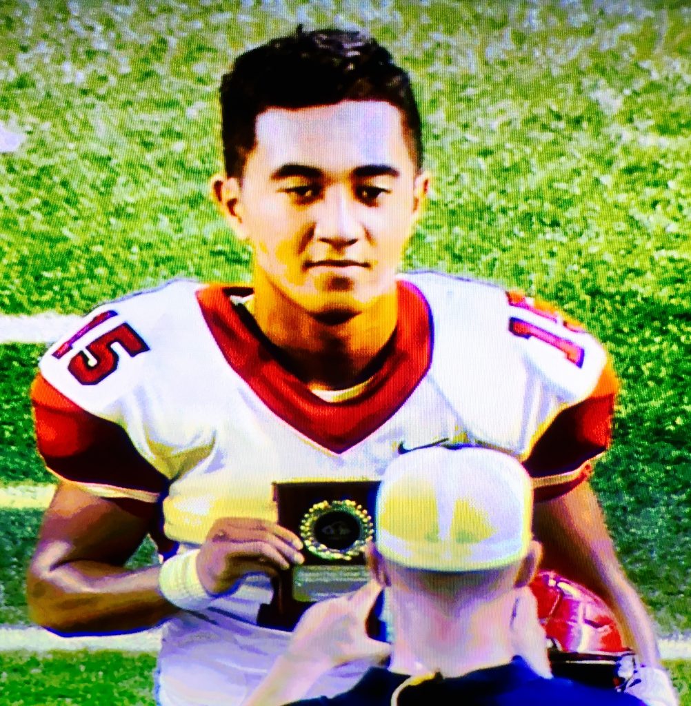 Lahainaluna's OC16 Impact Player of the Game Siale Hafoka poses with his hardware after helping the Lunas to a 21-14 win against Kapaa Friday at Aloha Stadium. Photo from OC 16 broadcast.