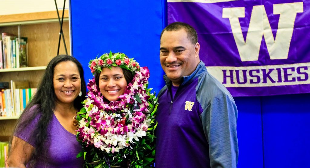 Nawai Kaupe poses for pictures with her mom, Joy, and dad, "Napa" following her official signing Wednesday, Nov. 9, at Maui High School. Photo by Ben Juan.