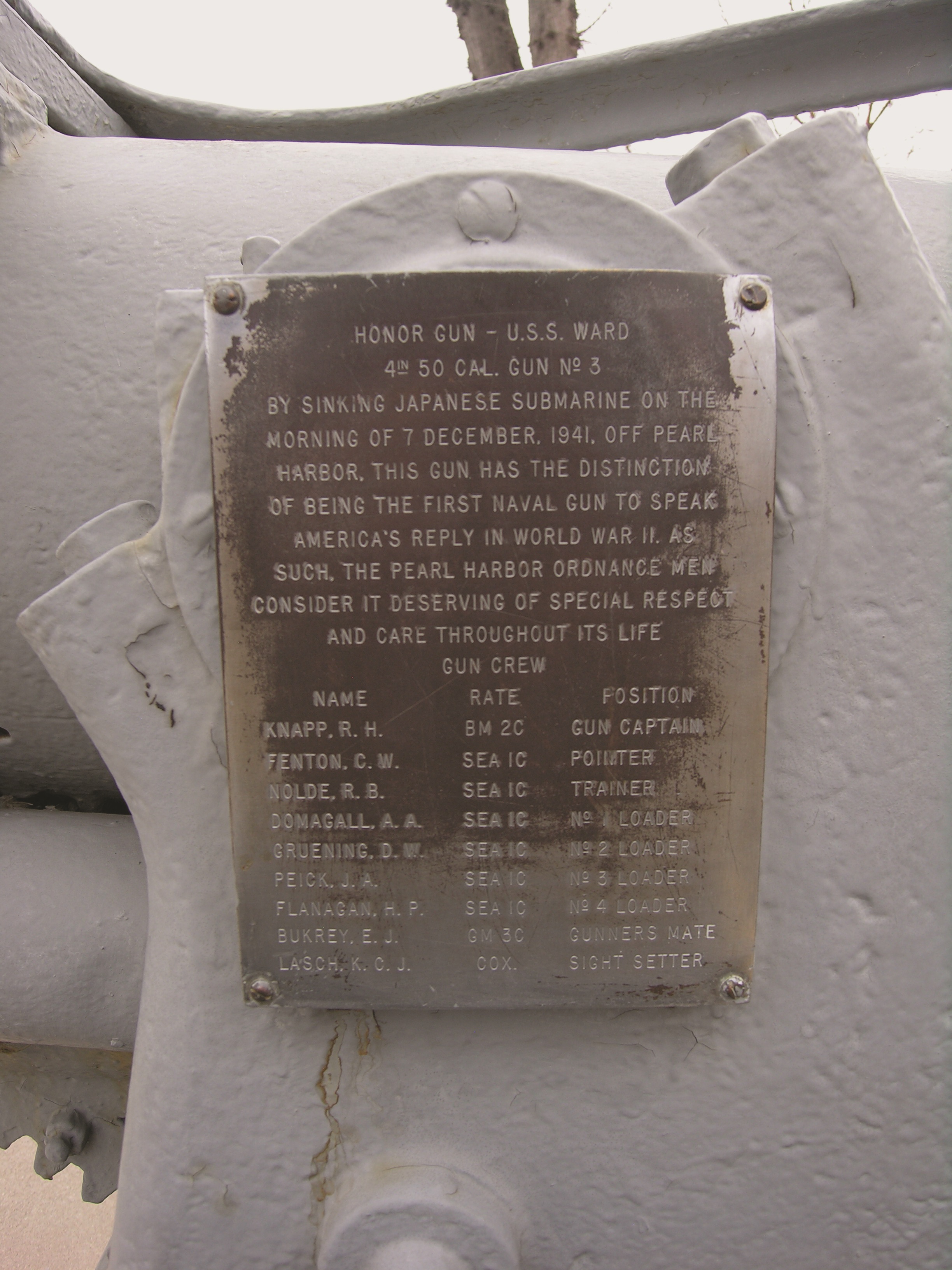 A plaque attached to the USS Ward gun lists the names of the gun crew and speaks to the gun's significance. Credit: James P. Delgado