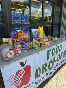 Donations fill a table at Lahaina Safeway. Courtesy photo.